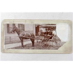 ANTIQUE MOUNTED PHOTO OF 2 WOMEN IN A BUGGY OUTSIDE A PHOTOGRAPH SHOP