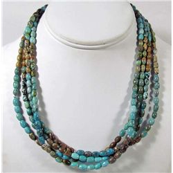 FOUR STRAND TURQUOISE NECKLACE W/ STERLING SILVER CLASP