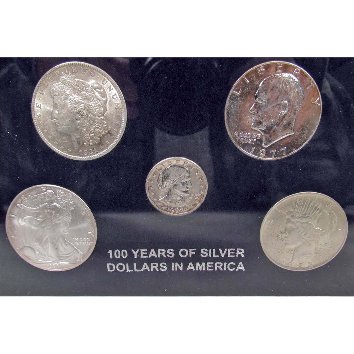 SET OF US SILVER DOLLARS IN DISPLAY CASE