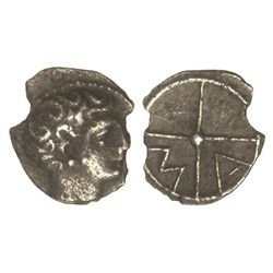 Óbolo. - 400 a.C. - MASSALIA. - Anv.: Cabeza masculina a derecha. Rev.: Rueda con cuatro radios