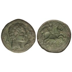 As. - CELSE. - Anv.: Cabeza masculina a derecha, rodeada por tres delfines. Rev.: Jinete con palma a