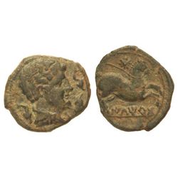 Cuadrante. - ILTIRTA. - Anv.: Cabeza masculina a derecha rodeada de tres delfines. Rev.: Caballo a d