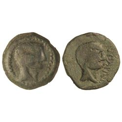 As. - ILURCO. - Anv.: Cabeza masculina a derecha. Rev.: Cabeza masculina a derecha, delante ILVRCON.