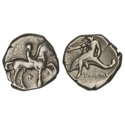 Didracma. - 380-345 a.C. - TARAS. - Anv.: Jinete a derecha. Rev.: Taras sentado sobre delfín a izqui