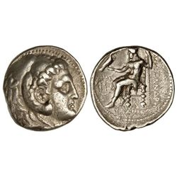 Tetradracma. - 336-323 a.C. - ALEJANDRO MAGNO. - Anv.: Cabeza de Hércules con piel de león a derecha