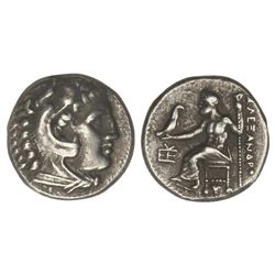 Dracma. - 336-323 a.C. - ALEJANDRO MAGNO. - TRAELIUM. MACEDONIA. - Anv.: Cabeza de Hércules con piel