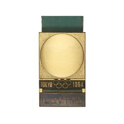 Medalla Olimpiada Tokio. - 1964. - TEAM OFICIAL. JAPÓN. - Anv.: Círculo dentro cuadrado, debajo leye