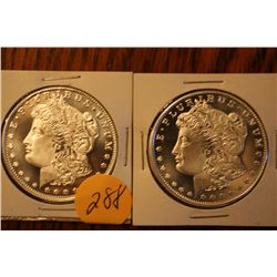(2) one troy oz morgan coins