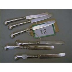 Six silver handled butter knives, hallmarked Sheffield 1919.