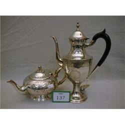 Victorian style plated coffee pot plus decorative tea pot.