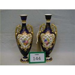 Pair of Crown Derby spill vases, in cobalt blue, with heavy gilding, fronts having handpainted flowe