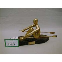 Brass sculpture of rower, marked Magdalen College Rowing Club,1922.