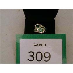 18ct yellow gold ring with emerald/diamond twist design, diamond of .75ct.