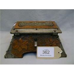 Art Nouveau musical trinket box in leather and pewter, signed T. Ralli-Scaramanga, dated 1903.