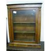 Late Victorian mahogany glazed door cupboard with brass mounts and inlay.