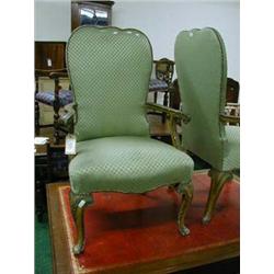 Pair of Italian open armchairs with shaped backs and scroll work to arms and legs.