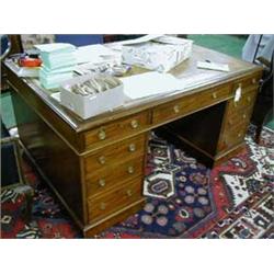 Superb Victorian mahogany partners desk with faded tooled top, comprising twelve drawers with ring p