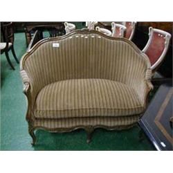 19th century walnut framed five legged lovers seat with striped upholstery, in good condition.
