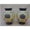 Image 1 : Pair of Burmantofts vases, decorated in yellows, blues and pale greens and opening flowers, with blu