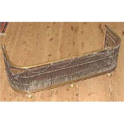 A  late  Victorian brass mesh D-shaped fende