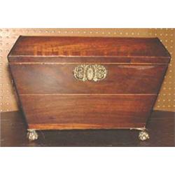 A  Regency inlaid mahogany sarcophagus shape