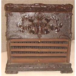 A  Black  Forest  carved  walnut  cigar