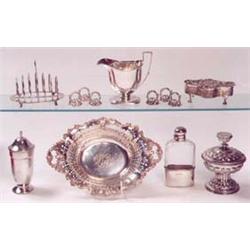 AN  ARTS  &  CRAFTS  SILVER  PEDESTAL  CUP