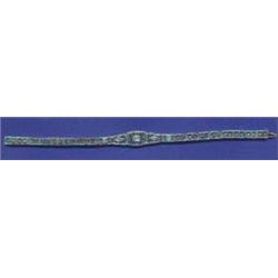 AN ART DECO PLATINUM, GOLD AND DIAMOND