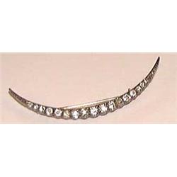 A  DIAMOND  CRESCENT  BROOCH, set with