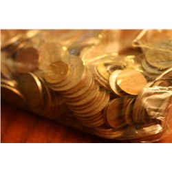 2.5 pounds of foreign coins