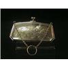 Image 1 : A purse of shaped rectangular outline, engrav