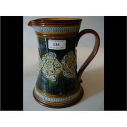 A Doulton Lambeth Jug, with floral moulded...