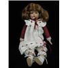 Image 1 : A Bisque head doll with open mouth and a c...