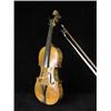 Image 1 : A cased violin and bow, with a 2 piece bac...