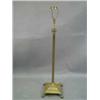 Image 1 : A brass adjustable standard lamp with a co...