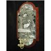 Image 1 : A girandole with an engraved mirror back a...