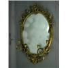 Image 1 : A Victorian oval gilt and gesso girandole,...