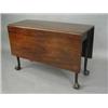 Image 1 : A George III mahogany drop leaf table, rai...