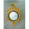 Image 1 : A Regency circular convex giltwood wall mi...