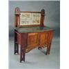 Image 1 : An Arts and Crafts oak washstand with a ti...