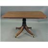 Image 1 : A mahogany breakfast table, with a reeded ...