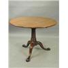 Image 1 : A George III mahogany tripod table with a ...