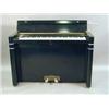 Image 1 : An Art Deco 'Eavestaff Minipiano' in an eb...