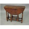 Image 1 : A yewwood drop leaf table, with turned sup...