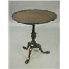 Image 1 : A George III style pie crust tripod table....