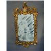 Image 1 : A George III Rococco style giltwood mirror...