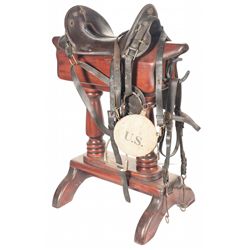 Cavalry Saddle, Saddle Stand, U.S. Marked Bridle, Sword and a Canteen