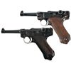 Image 1 : Two Luger Semi-Automatic Pistols -A) DWM 1917 Dated Model 1914 Luger Semi-Automatic Pistol