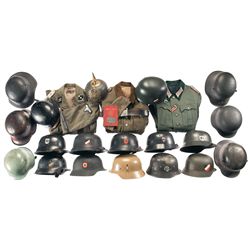 Three Nazi Jackets and a Grouping of Nineteen German Helmets