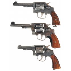 Three Double Action Smith & Wesson Revolvers -A) U.S. Property Marked Smith & Wesson Victory Model D